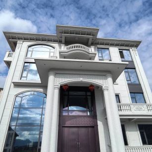 陕西白麻别墅外墙干挂石材效果示例