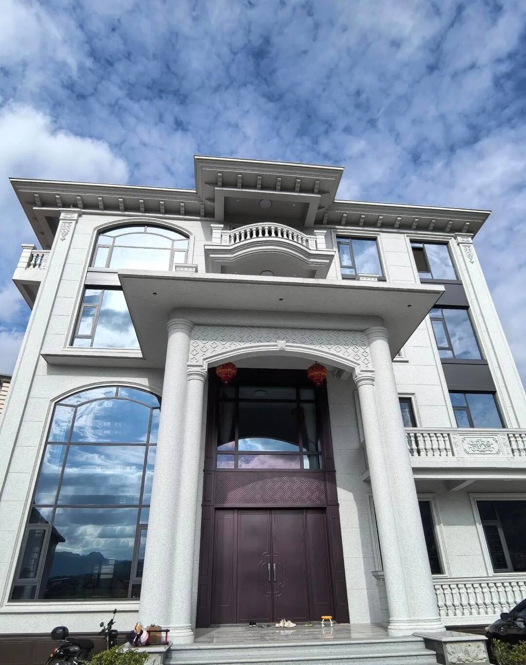 陕西白麻别墅外墙干挂石材效果示例