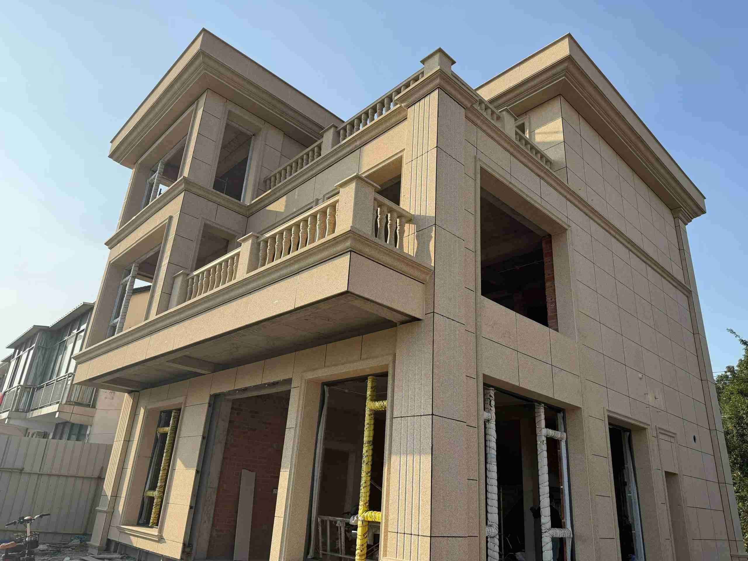 陕西 黄金麻花岗岩石材荔枝面外墙干挂效果展示