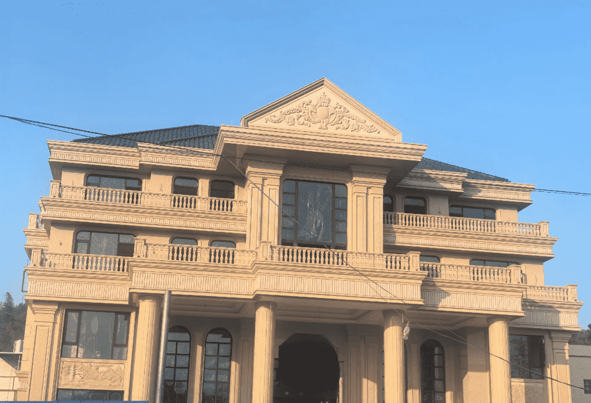 陕西黄金麻别墅外墙干挂石材效果示例